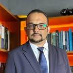 Dr. Armando César